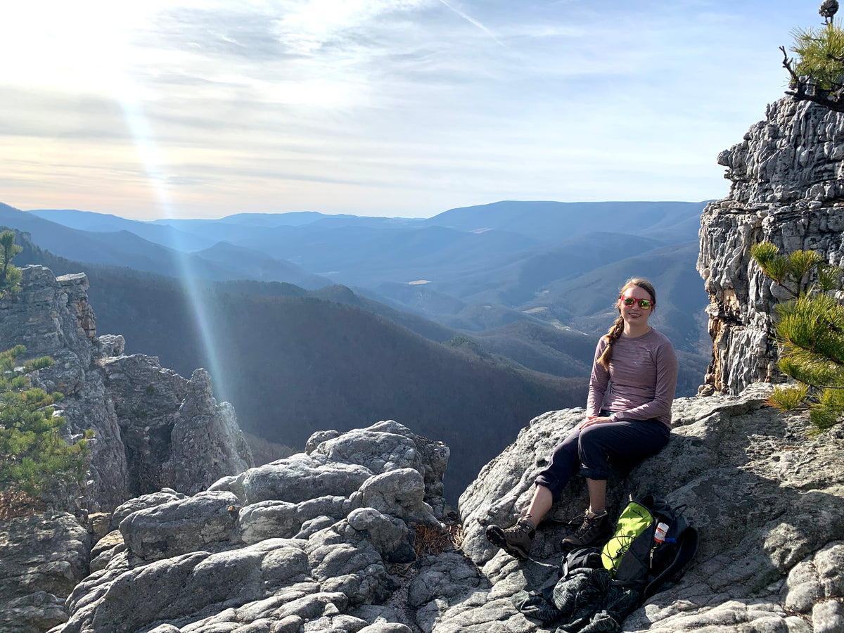Octavia on top of Chimney Top rock at North Fork Mountain