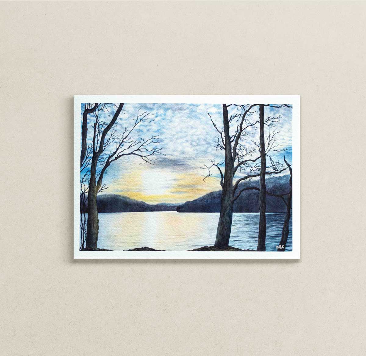 7" x 5" art print of a sunset over Cheat Lake, WV with bare trees on a beige wall.