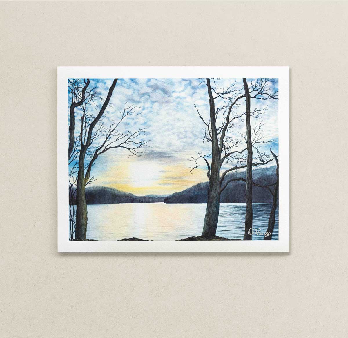 8" x 10" art print of a sunset over Cheat Lake, WV with bare trees on a beige wall.