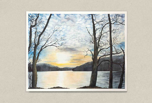 Painting of a sunset over Cheat Lake with bare trees on a beige wall.