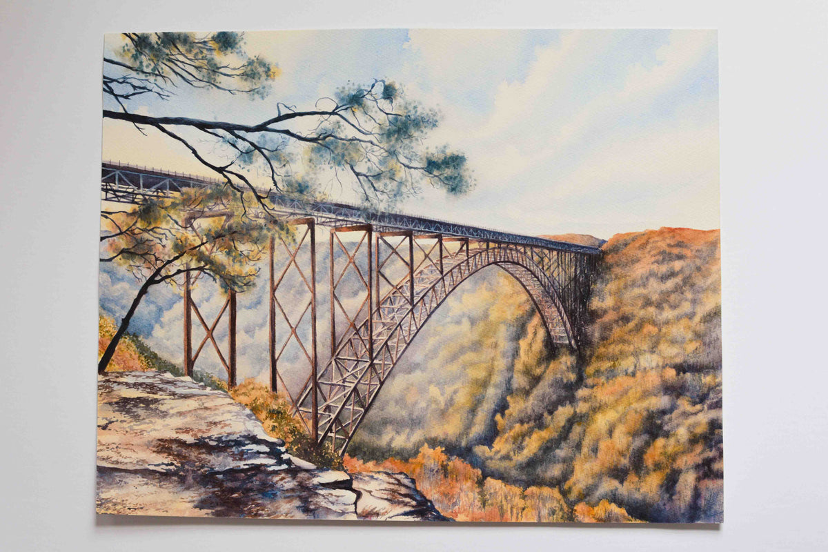 A watercolor painting of the large arched New River Gorge Bridge. 