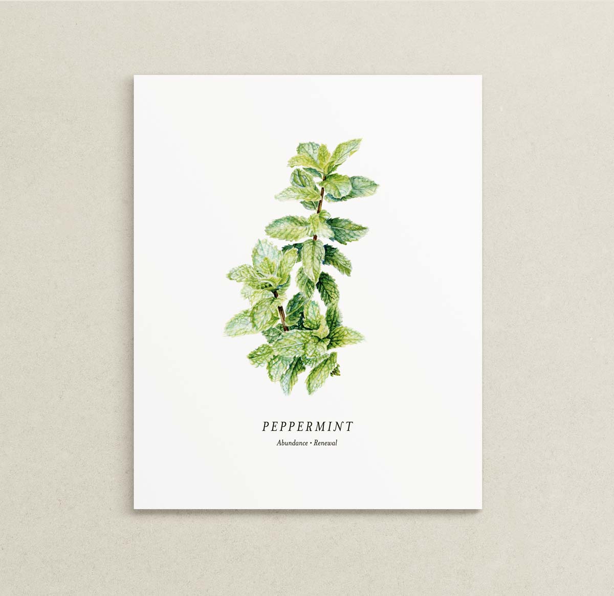 A vertical white art print featuring a watercolor illustration of a green peppermint plant stem with the text 'PEPPERMINT' and 'Abundance | Renewal' printed below, displayed against a neutral textured beige background.