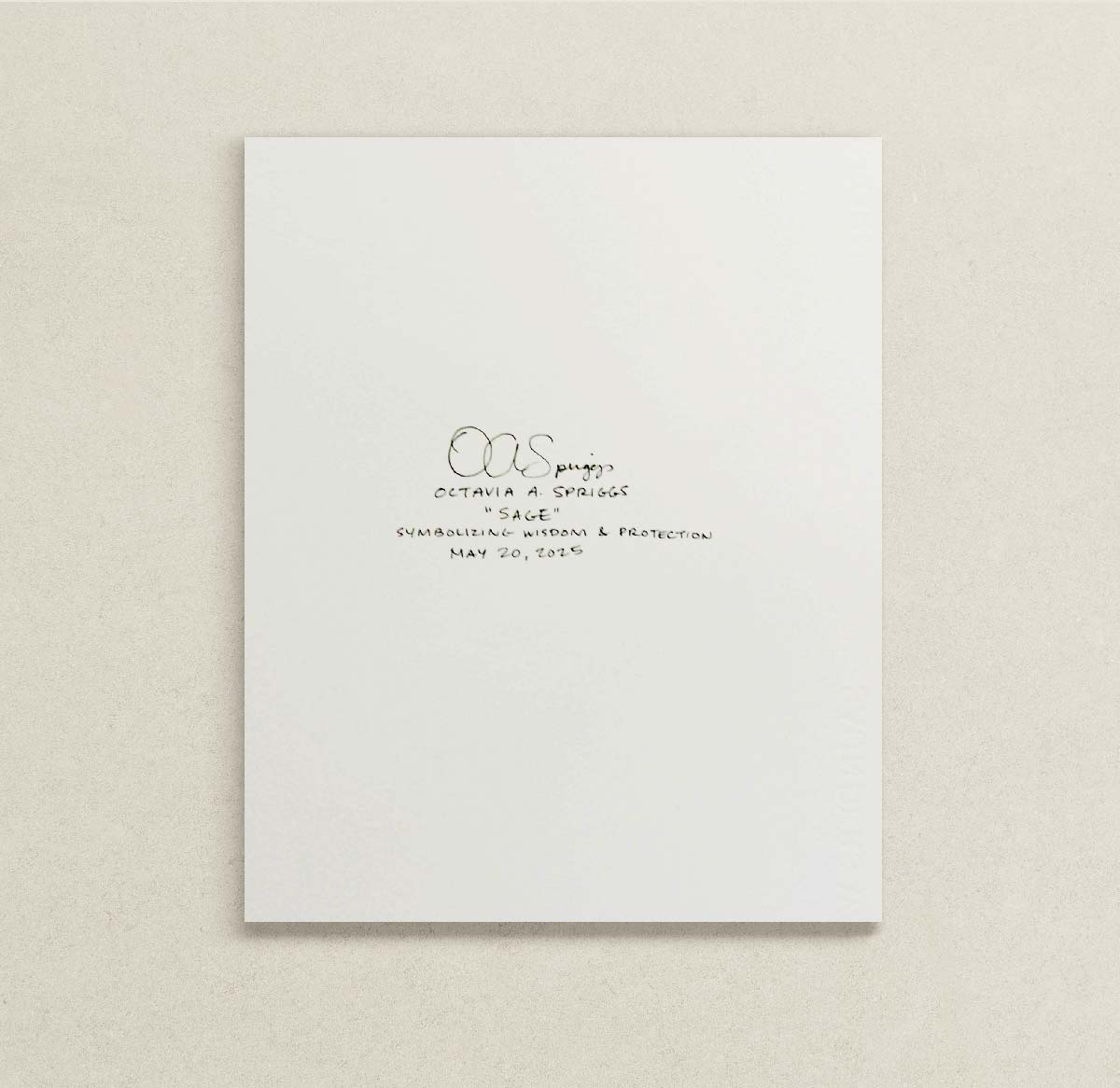 Backside of the original sage painting with black handwritten text and signature, displayed against a textured light beige wall.