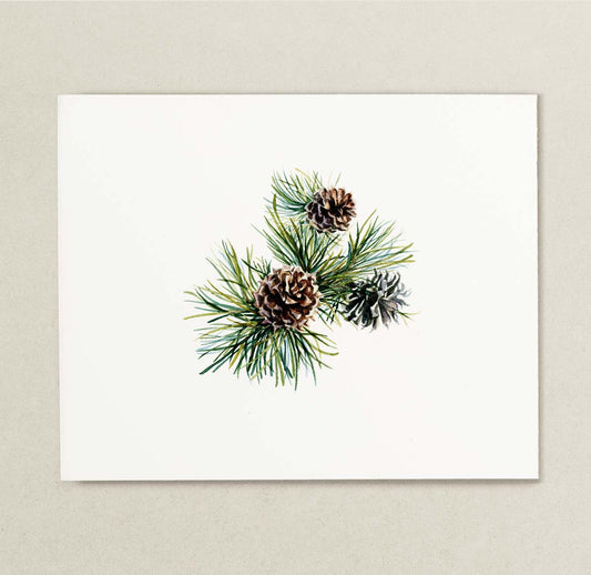 A watercolor painting featuring pine needles and three pinecones on a white rectangular card, displayed against a textured light beige background.